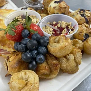a platter of pastries and fruit