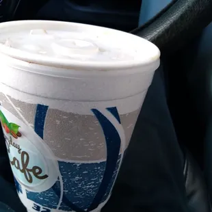 a drink in a plastic cup