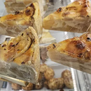 This apple pie is filled with baked apples and a custard filling with a caramelized top.