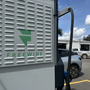 a freewire charging station in a parking lot