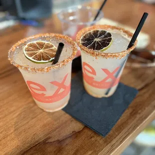 two margaritas on a table