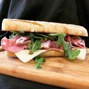 a sandwich on a cutting board