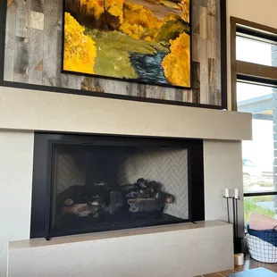 Nice indoor fireplace to lounge by