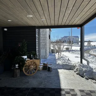 Front entrance area with a cute wagon