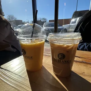Mango smoothie and iced lavender latte with oat milk