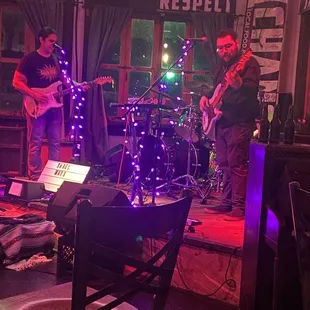 a band playing in a pub