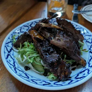 Grilled lamb ribs, lapsang honey glazed, cucumber, pea greens, mint, labne