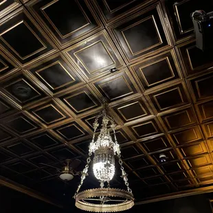 a chandelier hanging from the ceiling