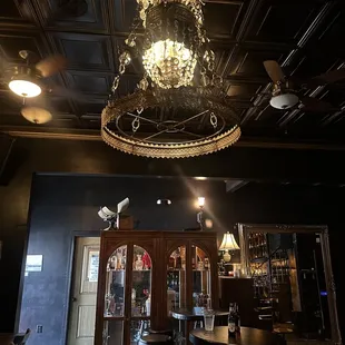 a chandelier in the middle of the room