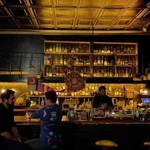 people sitting at a bar