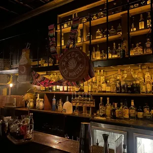 a bar filled with bottles of alcohol