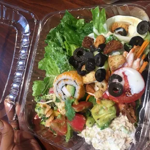 a salad in a plastic container