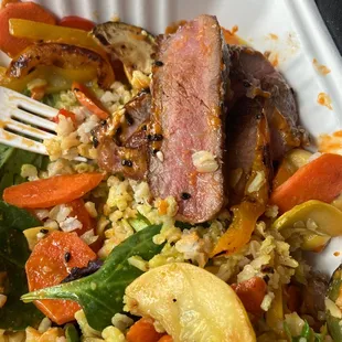 a meal in a styrofoam container