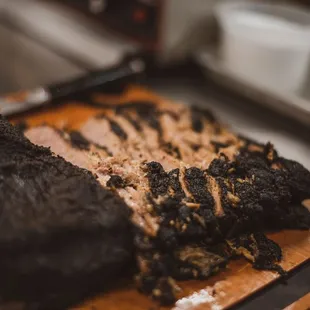 a piece of meat on a cutting board