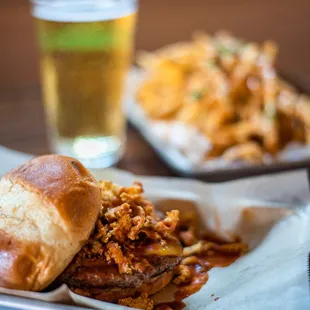 a pulled pork sandwich and a beer