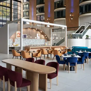 a restaurant with tables and chairs