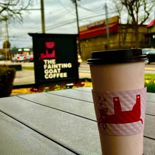 a cup of coffee on a table