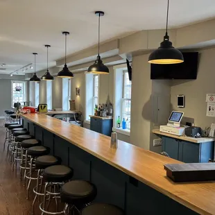 a man standing at the bar