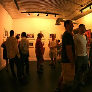 a group of people standing in a room