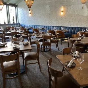 a restaurant with tables and chairs