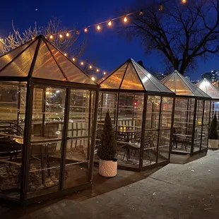 a row of glass greenhouses