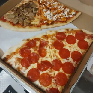 Specialty Pizza slices: pepperoni, sausage &amp; mushrooms  and Buffalo chicken