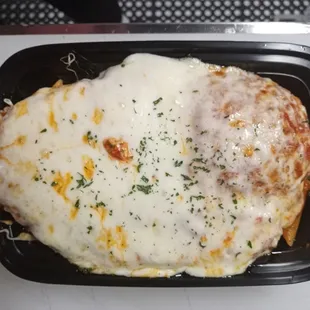 Chicken parm, made fresh with pasta directly from Italy and hand battered chicken.