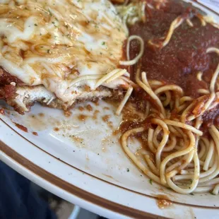 a plate of spaghetti and meat