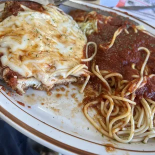 a plate of spaghetti and meat