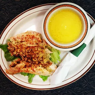 a plate of food and a bowl of soup