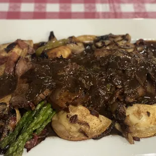 Prime brisket with pierogi and asparagus