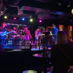 a band performing on stage