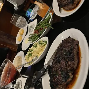 Ribeye (20 oz) Mashed Potatoes &amp; Green Beans for our sides. Generous portions. Drinks were amazing as well