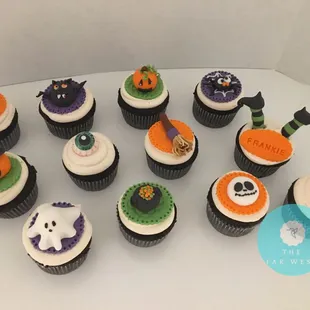 a variety of halloween cupcakes