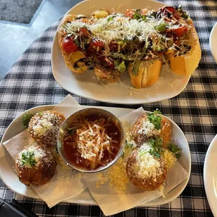 Appetizers : Fresh tomatoes &amp; Basil Bruschetta with balsamic drizzle , Risotto rice ball with side of Marinara