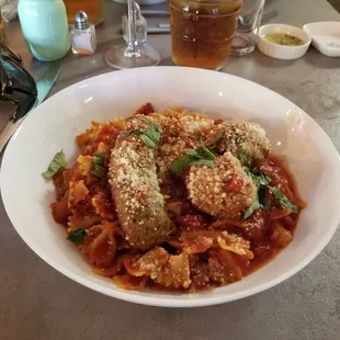 Farfalle pasta with sugu and homemade meatballs and Italian sausage.