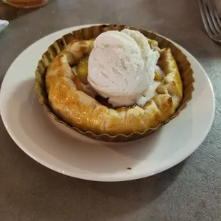 Peach tart with vanilla bean ice cream.