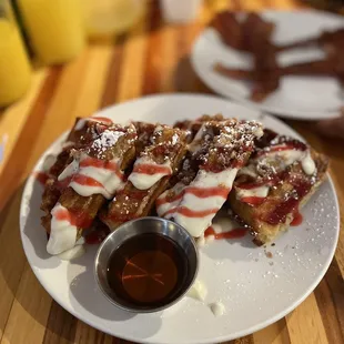 a plate of waffles with sauce
