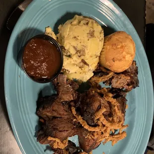 A dry plate of everything. Supposed to be brisket.