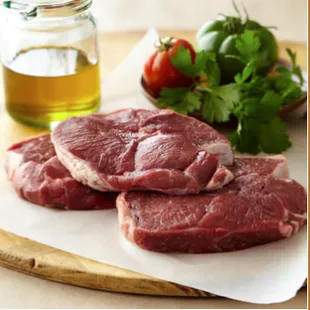 raw meat on a cutting board