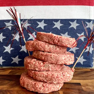 a stack of ground beef patties