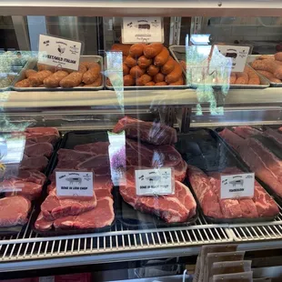 Different cuts of meat and sausage.