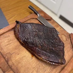 a steak on a cutting board