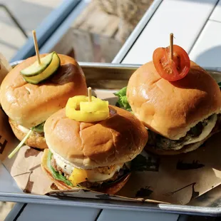 three sliders on a tray