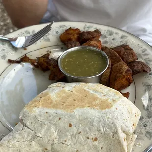Half of the breakfast burrito