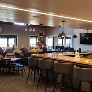 people sitting at the bar