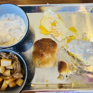 Cup of sausage gravy, 2 medium eggs, 1 biscuit and hash browns.