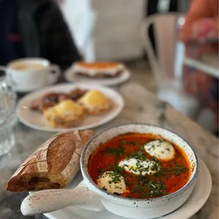 Camicia | eggs, house tomato sauce, mozzarella, house ricotta, fresh basil