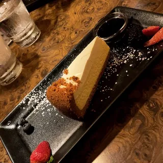 Homemade Traditional Cheesecake with Italian Wine Sauce