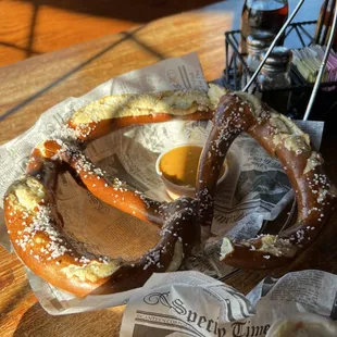 Giant pretzel with cheese sauce